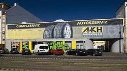 Abroncs Kereskedőház gumiszerviz, Fehérvári út 71-73. gumiszerviz főbejárat, parkoló. Új gumiabroncsok. A gumi.hu-n vásárolt téligumi, nyárigumi, négyévszakos gumi itt ingyenesen átvehető, így Ön spórol!
